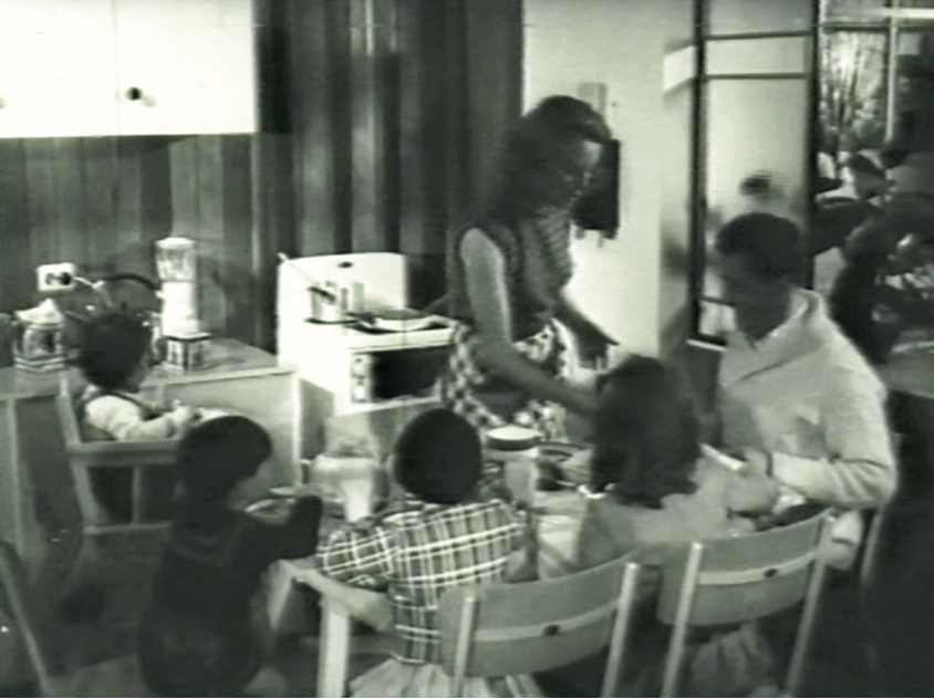 Figure 5: Still of housewife serving breakfast in an electric kitchen from A Penny Buys a Lot of Comfort, ESB television advertisement, 1964 (Courtesy of the ESB Archives).
